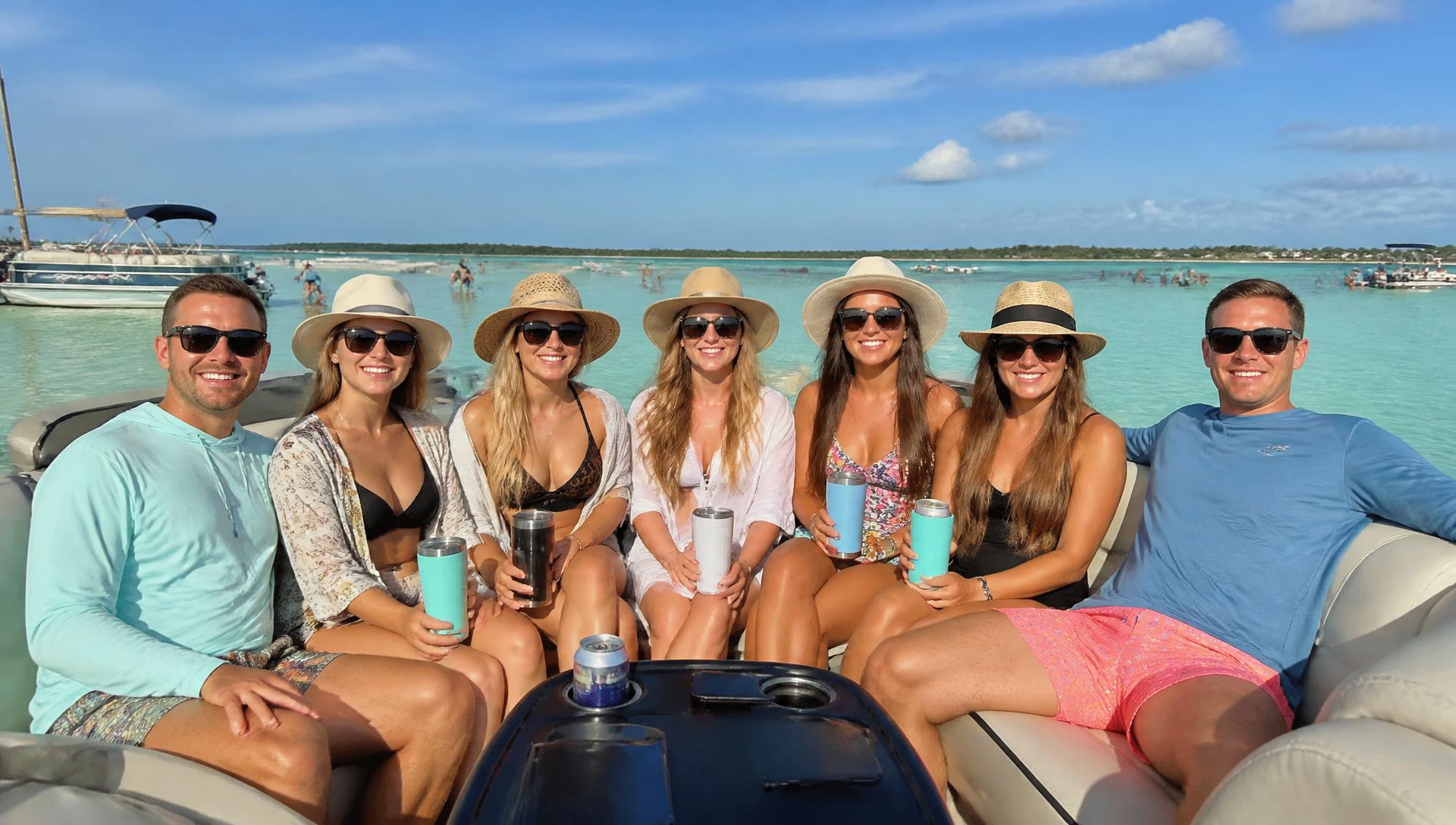 Friends on a pontoon boat at a Florida sandbar